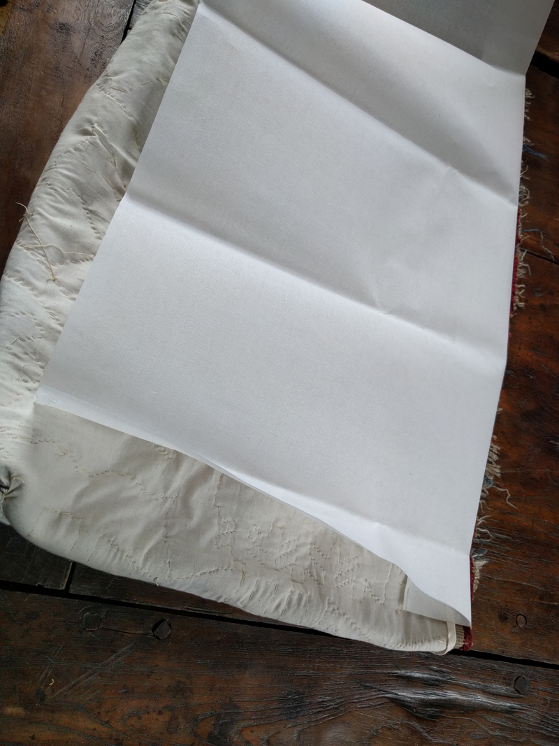 cutting the buckram to size